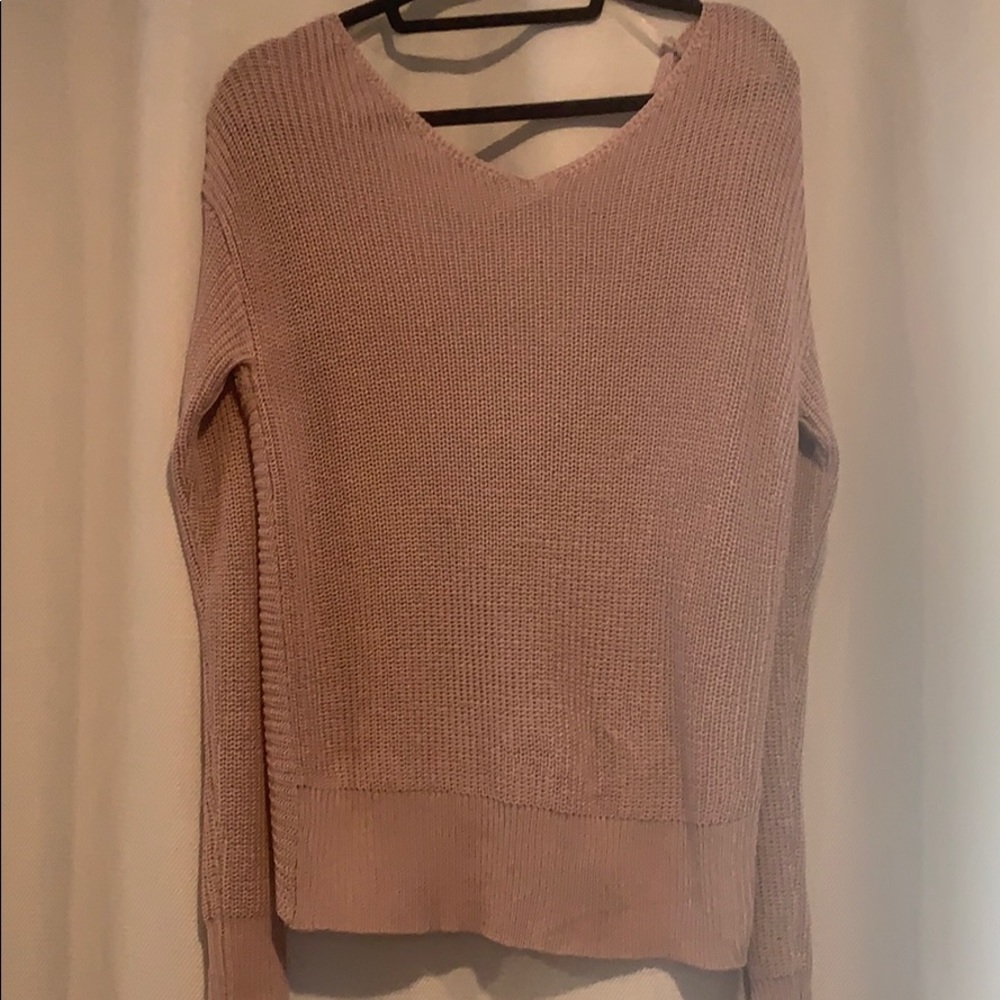 Knitted cross sweater